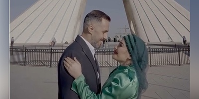 کلیپ فرمالیته یک زوج با لباس عروس متفاوت در برج آزادی+فیلم