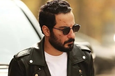 نوید محمدزاده با انتشار تصاویری از لاله های سرخ، بچه های میناب را از سرش باز کرد/ رفع تکلیف کردن به سبک بازیگر مشهور+عکس