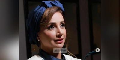 ایده سلطنتی پیراهن مجلسی به سبک شبنم قلی خانی با ترکیب رنگ عالی + عکس / چقدر خوب با گل های آبی و سرمه ای پس زمینه ست کرده