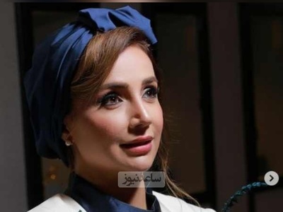 ایده سلطنتی پیراهن مجلسی به سبک شبنم قلی خانی با ترکیب رنگ عالی + عکس / چقدر خوب با گل های آبی و سرمه ای پس زمینه ست کرده