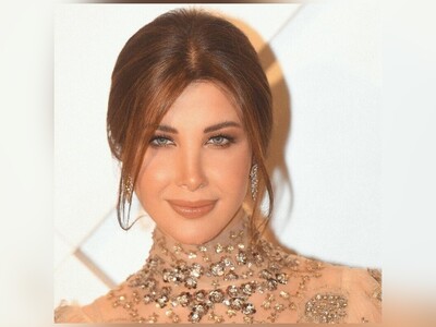 تصاویر لباس فوق شیک نانسی عجرم ، خواننده مشهور لبنانی +کیف میلیاردی اش