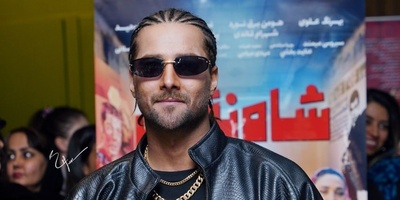 استایل امیر مقاره در اکران مردمی «شاه‎ نقش» که همه نگاه‌ها رو به سمت خودش جلب کرد؛ ترکیب شلوار راه راه با کت چرم و موهایی بافته شده! +ویدیو