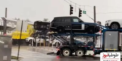 (فیلم) لحظه هولناک تصادف قطار با تریلی حامل بار خودروهای لوکس