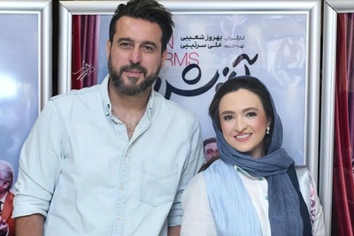 (عکس) محسن کیایی و گلاره عباسی در پشت صحنه فیلم سینمایی آغوش باز در کنار برج آزادی