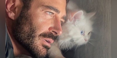 (عکس) شباهت عجیب رنگ چشم محمدرضا گلزار و گربه اش / لاکچری بازی آقای سوپراستار کم بود ست کردن رنگ چشم هم اضافه شد!