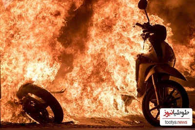 لحظه وحشتناک آتش گرفتن موتورسیکلت برقی و سواره‌اش+ ویدئو/ این دیگه چی بود!