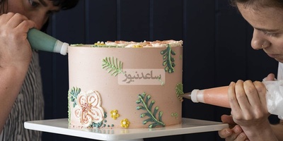 ابتکار منحصربفرد قناد شیرازی در طراحی و پخت کیک با چاشنی قیمت دلار و سکه+عکس/ بازتاب اقتصاد روز در طراحی کیک!