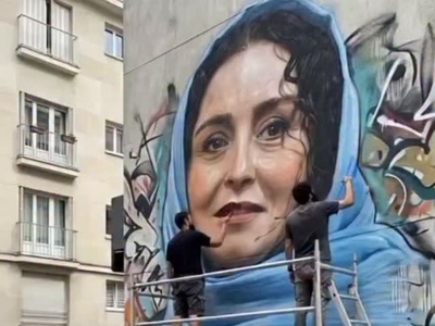 فیلم/ خلاقیت هوشمندانه هوش مصنوعی برای نقاشی دیواری پرتره ویژه ژاله صامتی چهره شهر را زیباتر کرد