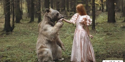 14 تصویر رویایی و حیرت‌انگیز دختر مو قرمز روسی با حیوانات جنگل که مو را تن بینندگان سیخ می کند