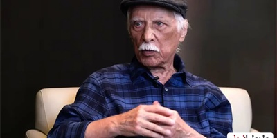 نگاهی به چیدمان منزل بهرام بیضایی با کتابخانه ای بزرگ، تابلو دیواری، پرده های کلاسیک و...