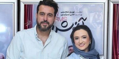 (عکس) محسن کیایی و گلاره عباسی در پشت صحنه فیلم سینمایی آغوش باز در کنار برج آزادی